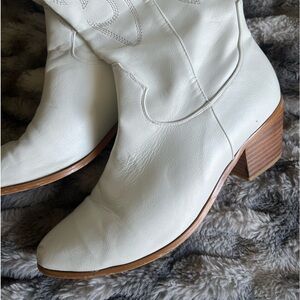 Tall white cowgirl boots!